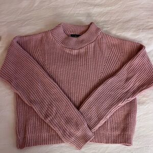 Knit blush turtleneck sweater